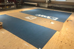 Load image into Gallery viewer, The first step in creating the leaf motif required whiting out the shape of the leaf on the multicolored background. Chambers House Floorcloth #1.