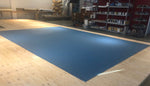 Load image into Gallery viewer, Production image of fused layers of canvas for the Chambers House Floorcloth, painted with a blue background color.