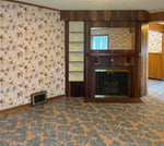 Load image into Gallery viewer, Chamber House Floorcloth #2 installed!! in the Living Room - showing fireplace.