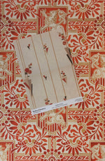 Load image into Gallery viewer, Close up of Bradbury & Bradbury wallpaper that inspired the palette for Lion & Shield Floorcloth #5.