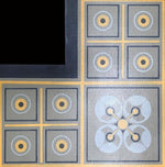 Load image into Gallery viewer, Close up of the inside corner of this shaped floorcloth based on a geometric Dresser design.