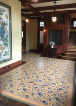Load image into Gallery viewer, In-situ image of a shaped floorcloth, made to perfectly fit this space.  The design is an all over floral pattern by Christopher Dresser.
