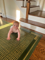 Load image into Gallery viewer, Autumn Leaves Floorcloth #5 with Joy Boy providing scale.