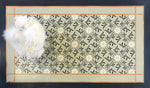 Load image into Gallery viewer, A full image of our Beaux Arts Floorcloth with Opal providing scale.