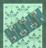 Load image into Gallery viewer, A close up of the Bungalow Branches Floorcloth #1 with the Bradbury & Bradbury wallpaper that inspired the palette.  The background color is a custom mix matching the leaves and the motif colors were mixed to match the line motifs in the paper.