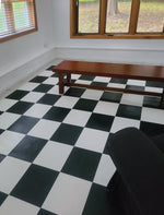 Load image into Gallery viewer, In-Situ image of this black and white checkerboard floorcloth - more furniture on the way!