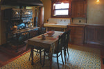 Load image into Gallery viewer, An in-situ image of Field House Floorcloth #2 in its Victorian kitchen.