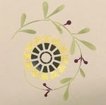 Load image into Gallery viewer, Close up of one of two flowers scattered in the interior of this floorcloth.