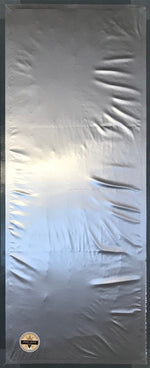 Load image into Gallery viewer, The backside of our Greek Windmills #4 floorcloth. Our floorcloths have a two layer backing. Carpet padding is placed in the cove created by the 2" glued hem. We then apply a layer of waterproof vinyl fabric that is adhered to the hem.
