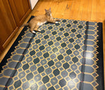 Load image into Gallery viewer, Honeycomb Floorcloth #2 in-situ, with the Nemo The Cat (NTK) providing scale (he can't be one-upped by Rupert.)