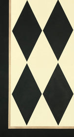 Load image into Gallery viewer, A close up of this harlequin patterned floorcloth in a soft yellow-white and charcoal colorway.