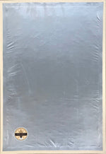 Load image into Gallery viewer, The backside of our Thistle floorcloth.  Our floorcloths have a two layer backing.  Carpet padding is placed in the cove created by the 2" glued hem.  We then apply a layer of waterproof vinyl fabric that is adhered to the hem.