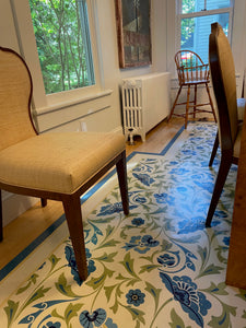 In-situ photo of All-Over-Floral Floorcloth #8, showing the cutout around the radiator.