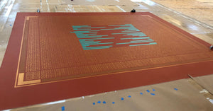 A production photo showing the marked off abstract center of the design for Autumn Leaves Floorcloth #8.