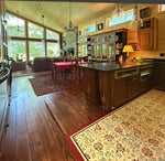Load image into Gallery viewer, In-Situ image of Chintz Floorcloth #6 showing the kitchen and great room area.
