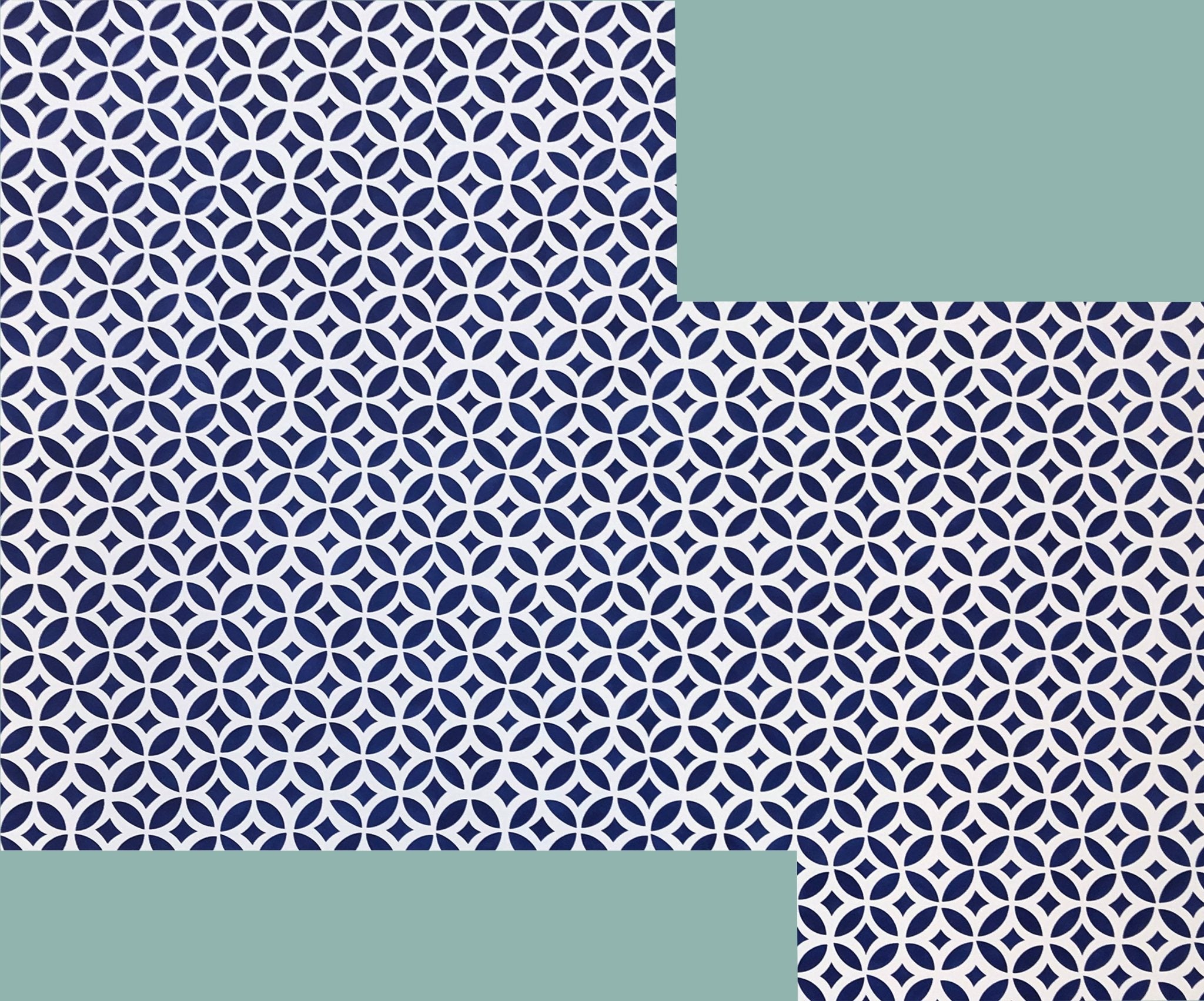 Full image of this shaped piece made to perfectly fit the footprint of the bathroom.  The pattern is a interlocking circle design.