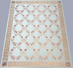 Load image into Gallery viewer, Full image of this floorcloth which is based on an ornate floral damask design that creates a trellis effect.  The border is an organic leaf and berry motif, deliberately given a worn effect, and the corners are hand-painted fruits based on carvings on the buffet in the room where this floorcloth resides.  
