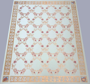 Full image of this floorcloth which is based on an ornate floral damask design that creates a trellis effect.  The border is an organic leaf and berry motif, deliberately given a worn effect, and the corners are hand-painted fruits based on carvings on the buffet in the room where this floorcloth resides.  