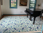 Load image into Gallery viewer, In-situ photo of this All-Over-Floral floorcloth in the music room of it&#39;s home in Northern Maine.
