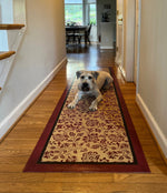 Load image into Gallery viewer, Gizmo posing on his new floorcloth. 

