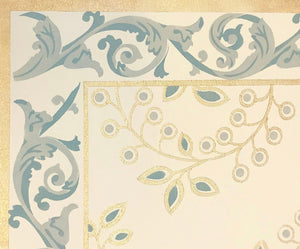 A close up image of the corner of this floorcloth with interior motifs based on a wallpaper ceiling pattern from Robert Graves & Co., c1880s and a stock scroll border.