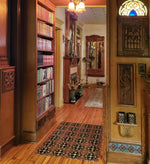 Load image into Gallery viewer, An in-situ image of Hay House Floorcloth #6 from the Gothic Library, looking into the dining room.
