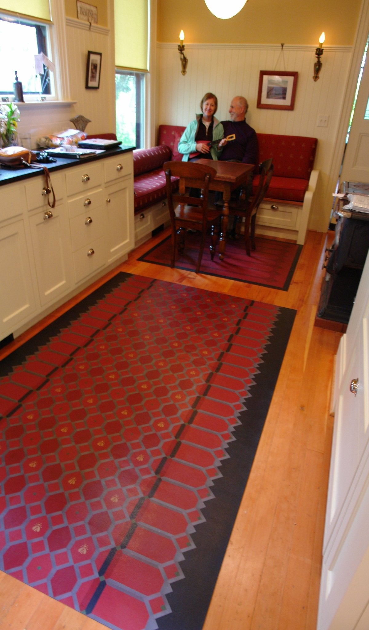 An in-situ shot of Honeycomb Floorcloth #1 in its lovely kitchen.