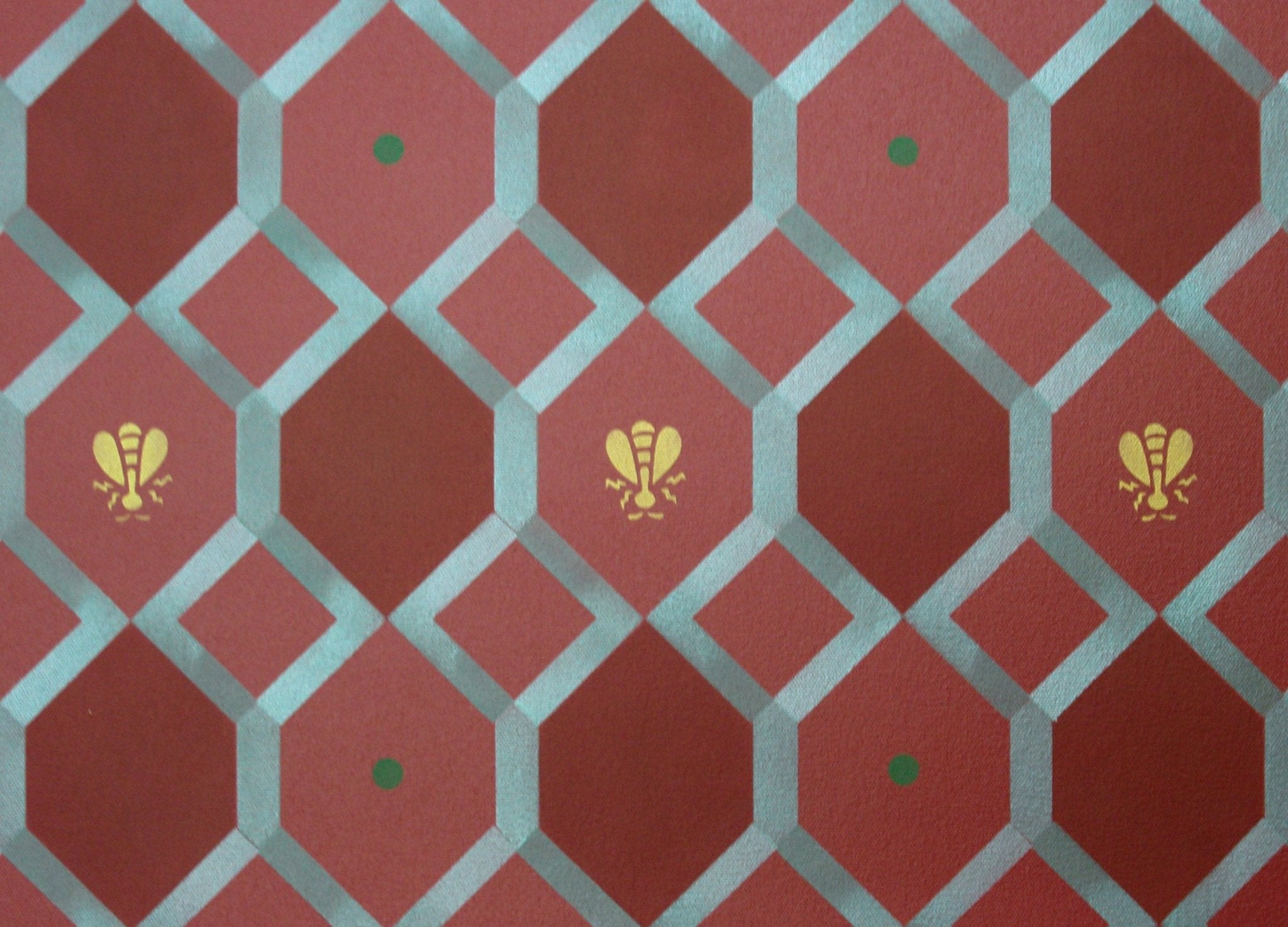 A close up of the center motifs, including the honeycomb, dots and bees, for the Honeycomb Floorcloth #1.
