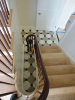 Load image into Gallery viewer, Installation photo of Hamilton Grange Floorcloth installed in the Stairwell.
