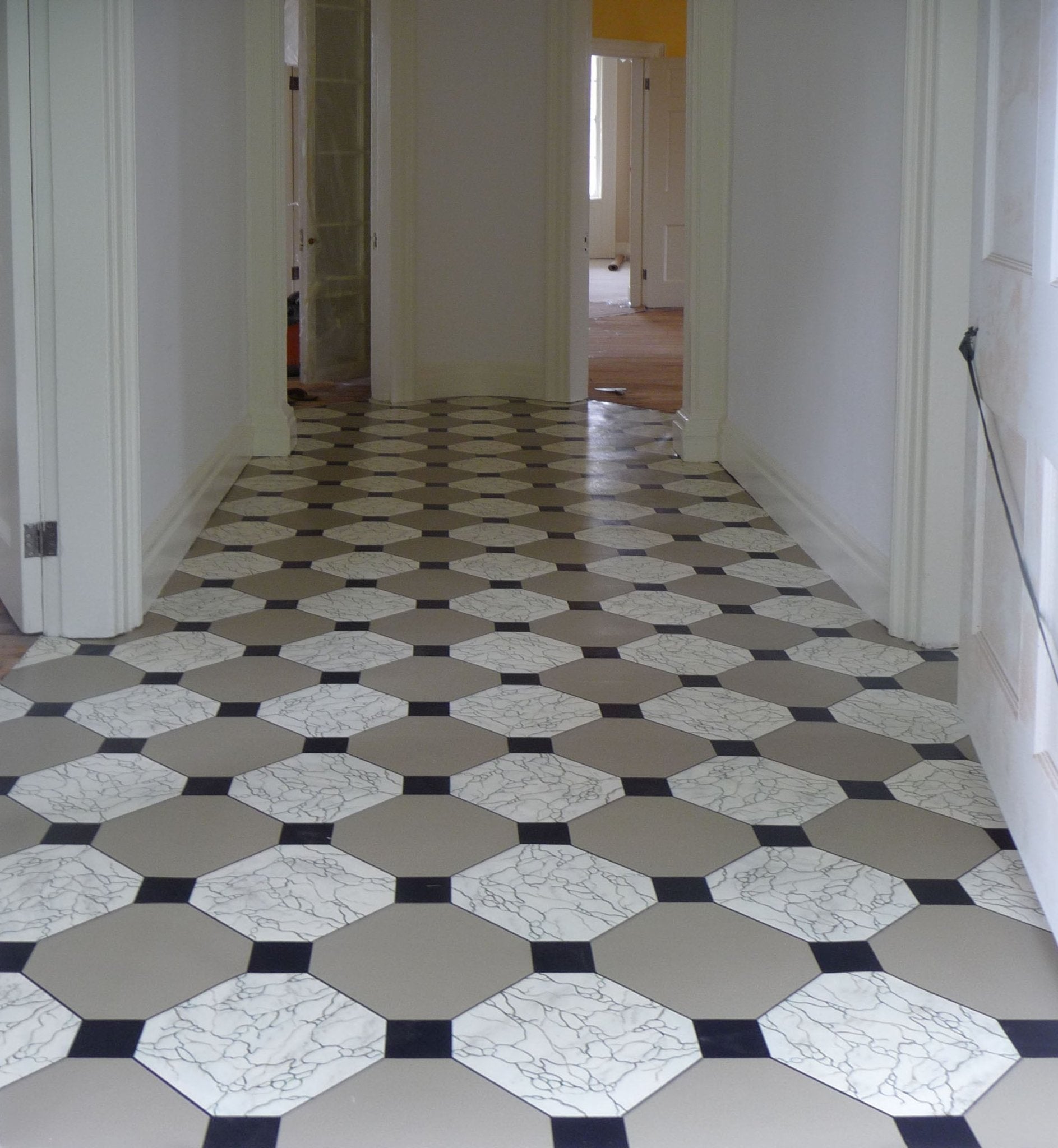 Installation photo of Hamilton Grange Floorcloth installed in the Back Hall.