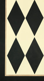 Load image into Gallery viewer, A close up of this harlequin patterned floorcloth in a soft yellow-white and charcoal colorway.
