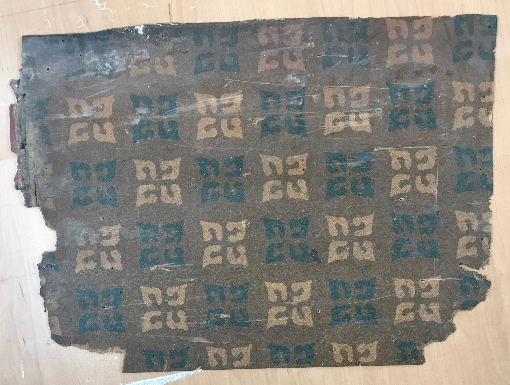 This is the linoleum scrap from which this floorcloth pattern was derived.