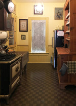 Load image into Gallery viewer, This is an image of the kitchen with the floorcloth installed wall-to-wall and all appliances and furniture back in place. 

