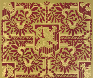 A close up of the pattern for this floorcloth featuring a lion in shield with floral and Greek Key elements.
