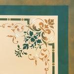 Load image into Gallery viewer, A close up of the corner of this floorcloth, showing the scrolls and floral elements that make up this victorian ceiling design which works well as a floorcloth design. 
