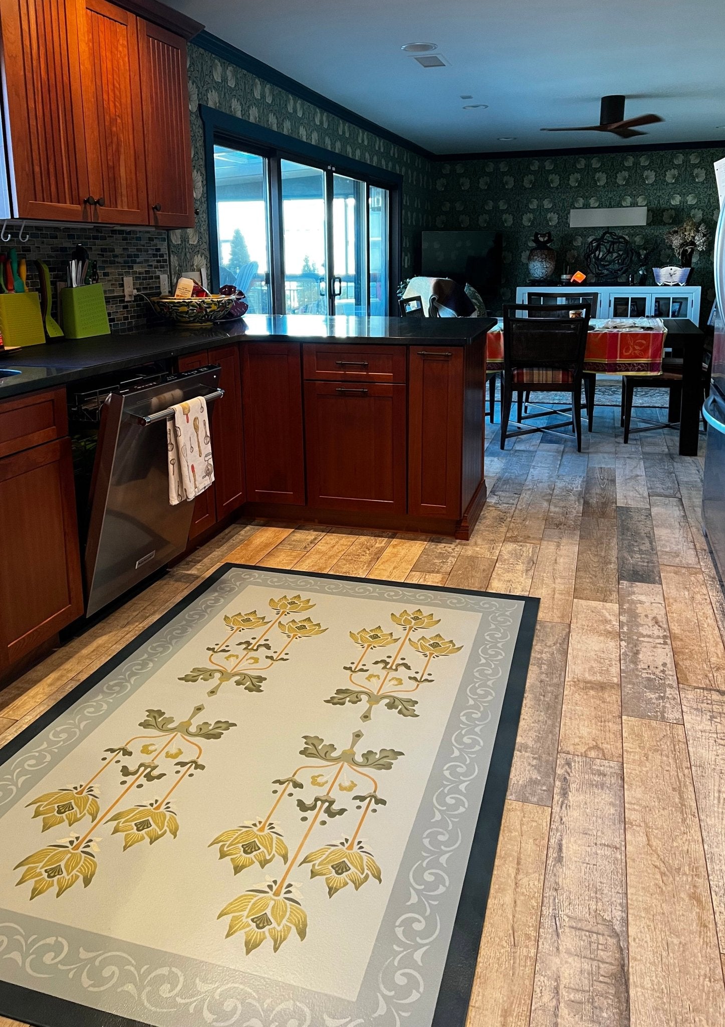 In-situ image of Poppy Floorcloth #3 with view into dining area.