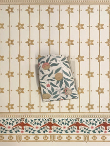 William Morris's "Fruit" wallpaper sample against the StarFlower #6 floorcloth.  The clients specified all of the colors using the paper as a guide and choosing paint colors from the Valspar and Benjamin Moore palettes. 