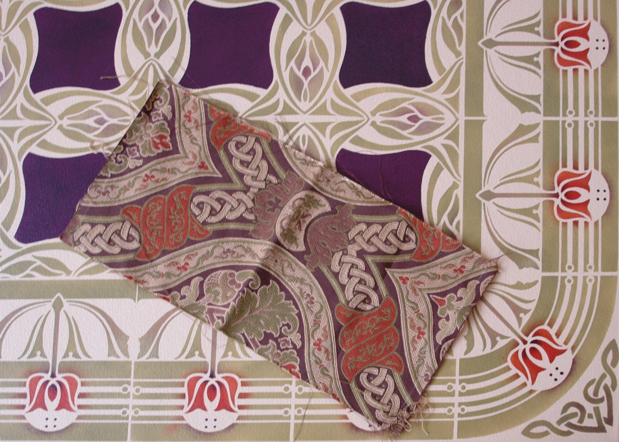 A photo of the floorcloth with the upholstery fabric that inspired the palette and the corner motifs for Wunderlich Floorcloth #5.